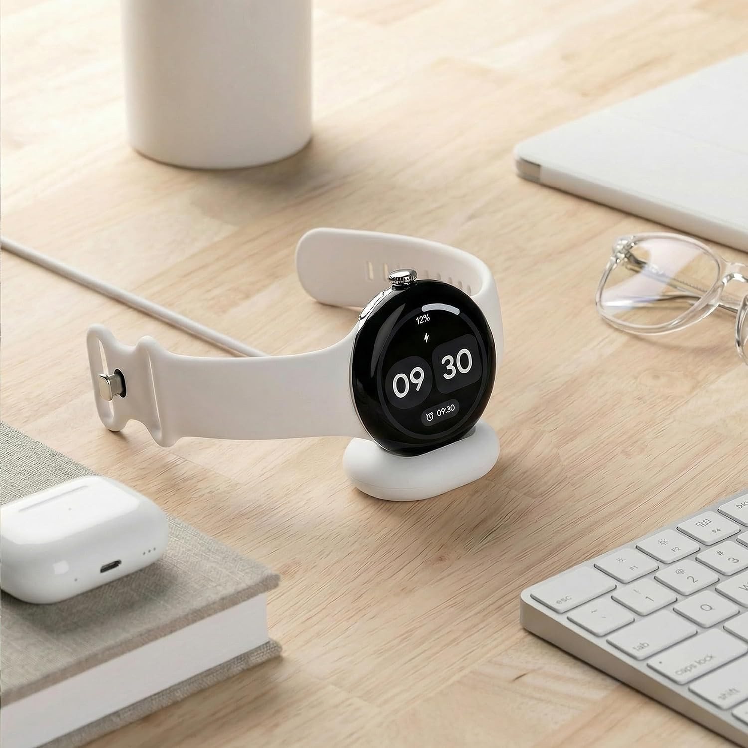 Pixel Watch charging on an AWINNER dock on a desk